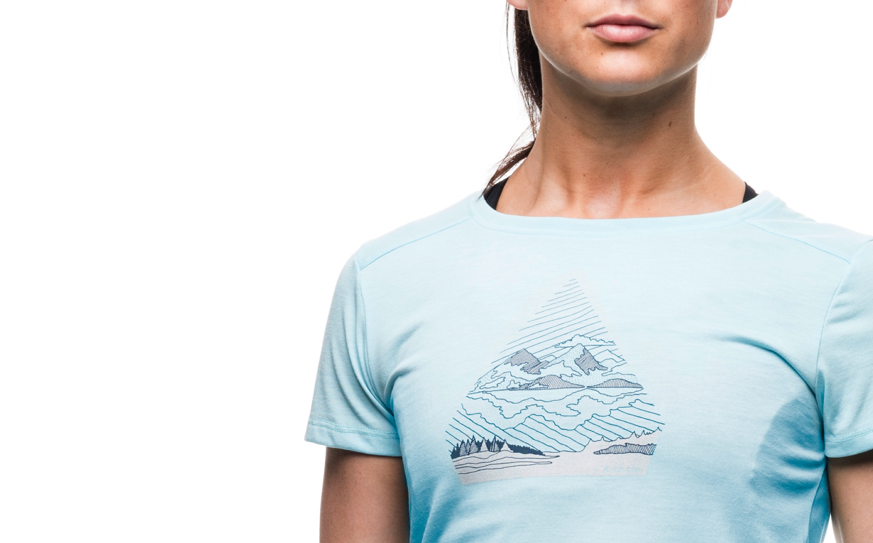Graphical expressions for Houdini Sportswear. Example From the collection. Tee shirt with print showing nature and mountains.